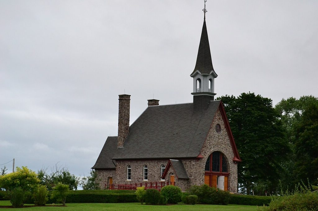 The Memorial Church at Grand-Pré in a modern photograph; a commemorative site, not a photograph of the 1755 deportation.