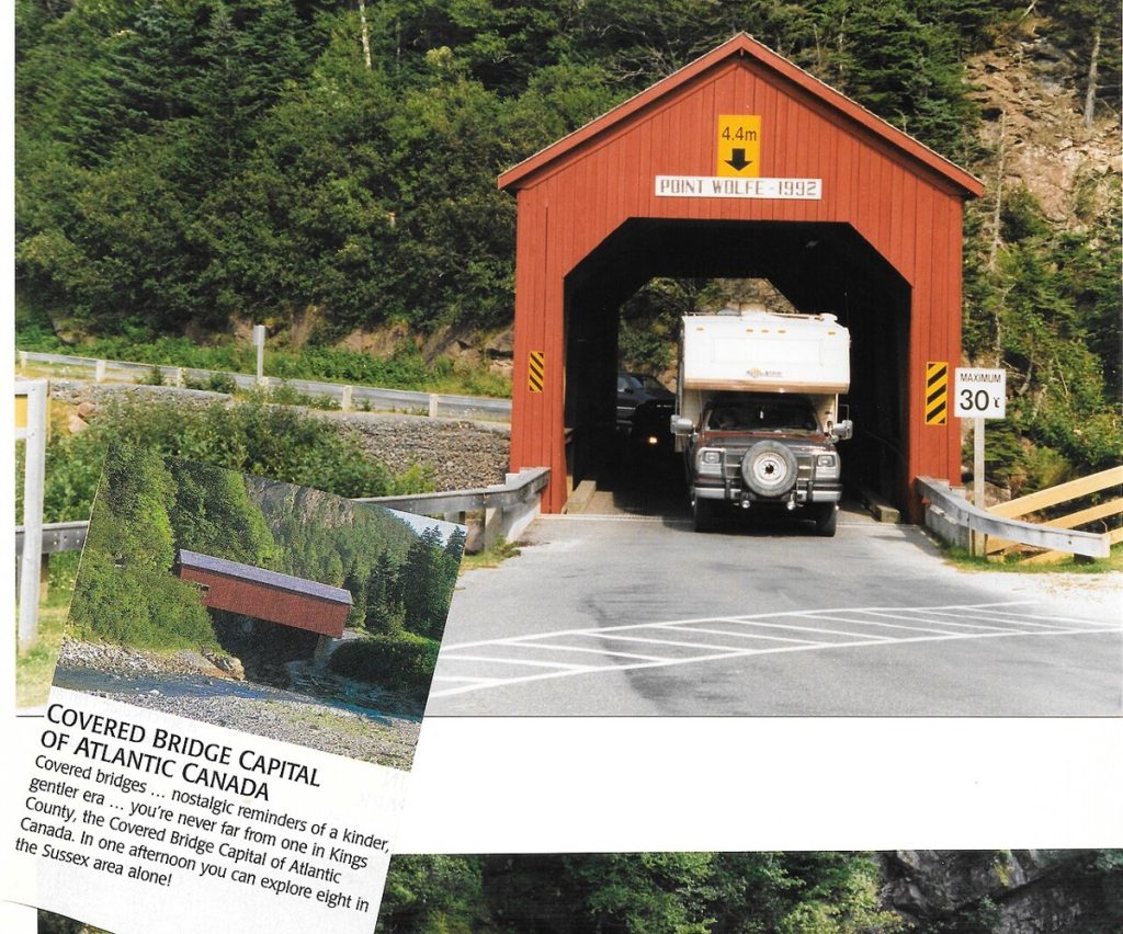 The Point Wolfe covered bridge in Fundy National Park, with an inset showing a photographed interpretive sign.
