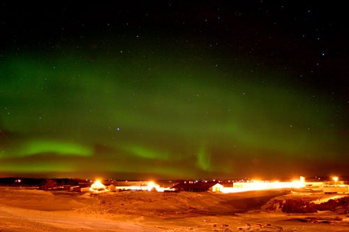 Northern lights over Canadian University College in Lacombe, winter 2005; the institution is now Burman University.