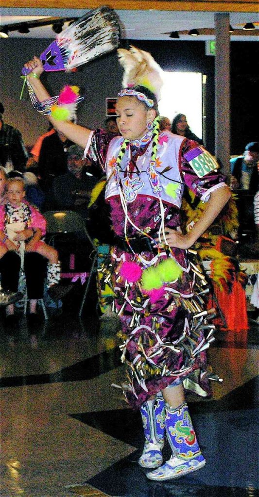 A jingle dress dancer at a community powwow in Helena, Montana, in 2007.