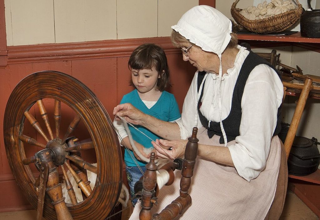 Spinning wool at the Highland Village Museum.