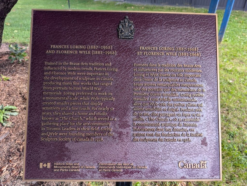 The commemorative plaque in Loring Wyle Parkette, Toronto, photographed in 2026.
