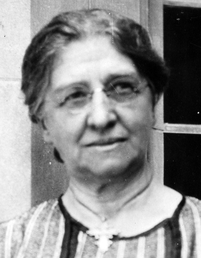 A portrait of Carrie Derick.