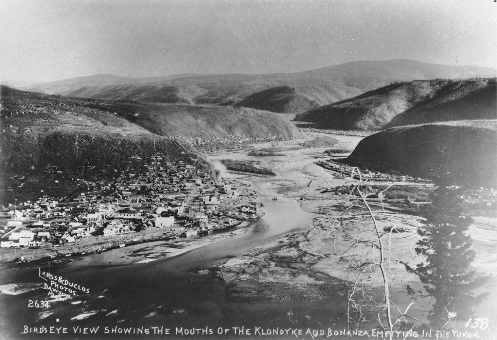 The mouths of Bonanza Creek and the Klondike River at the Yukon River, photographed in 1900 by Larss & Duclos.