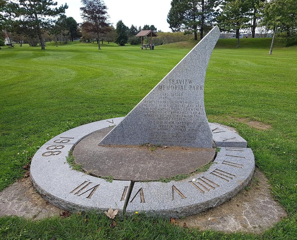 The Africville Monument at Seaview Memorial Park, Halifax, listing the community’s founding families, photographed in 2017.