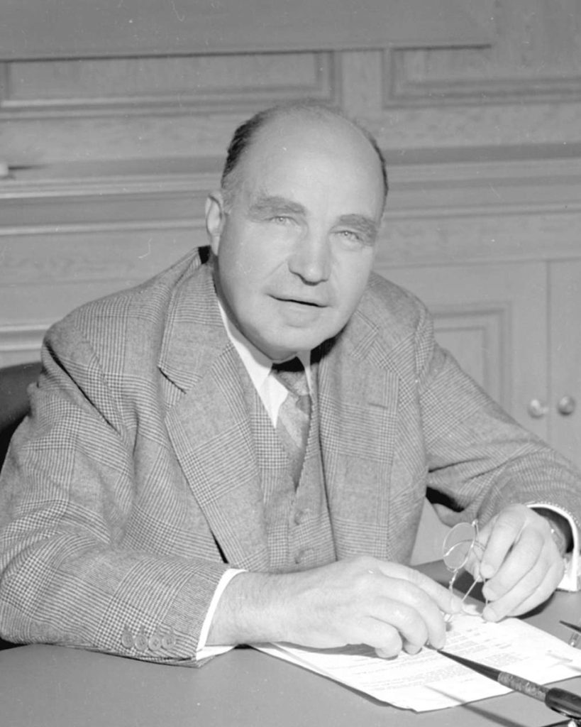 H.R. MacMillan at his desk, 1944.
